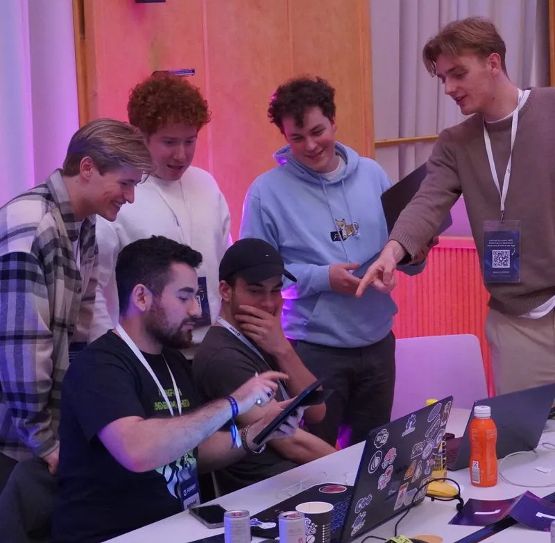 A team refining their solution before submission