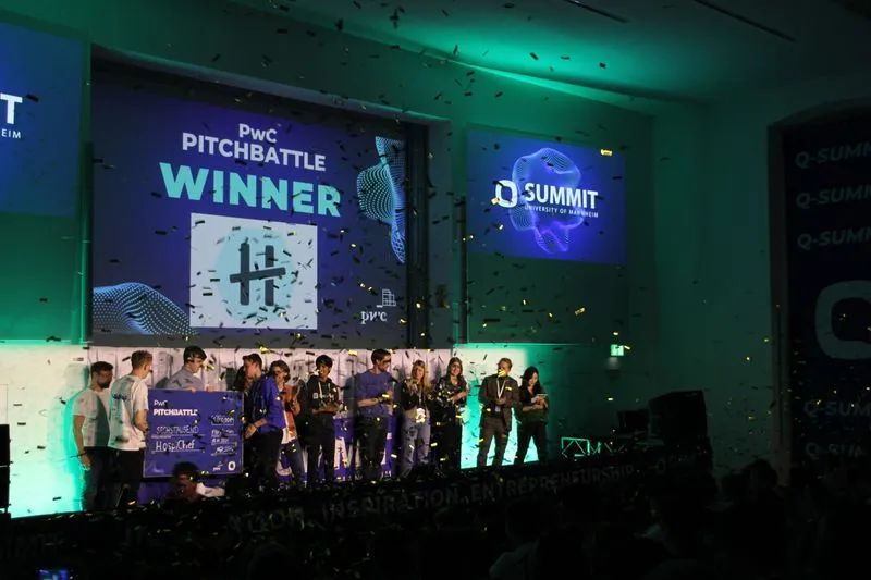 Startup founder pitching on stage